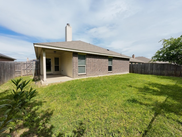 204 Spring Hollow Dr, Saginaw, TX 76131 - back of house featuring a patio and brick siding