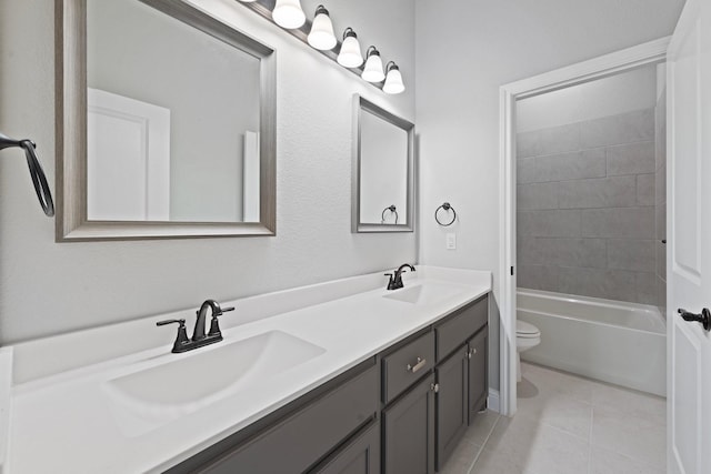 1038 Mickelson Dr, Granbury, TX 76048 - full bath featuring toilet, tile patterned floors, and double vanity