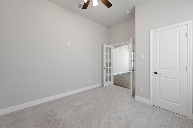 1038 Mickelson Dr, Granbury, TX 76048 - carpeted empty room featuring a ceiling fan, french doors, baseboards, and lofted ceiling