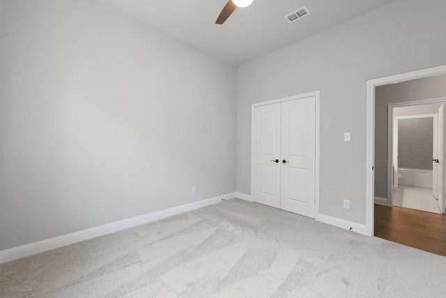1038 Mickelson Dr, Granbury, TX 76048 - unfurnished bedroom with carpet, baseboards, a closet, and ceiling fan