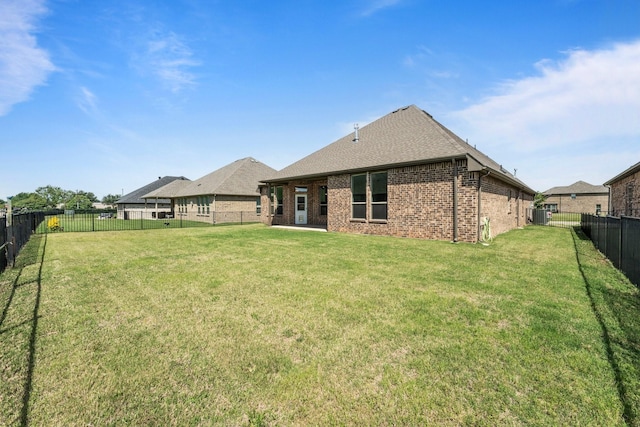 1038 Mickelson Dr, Granbury, TX 76048 - back of house with brick siding and a shingled roof