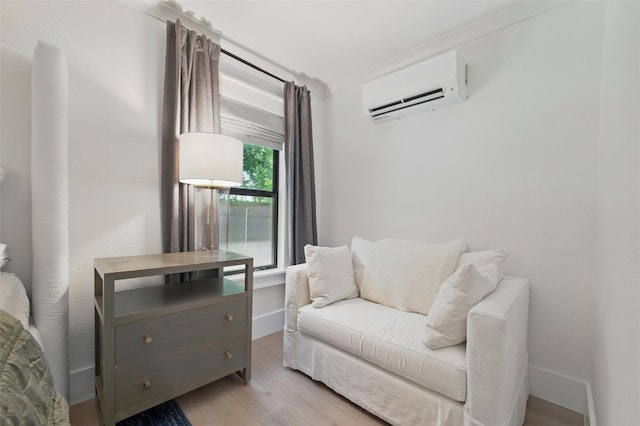 801 Edgefield Rd, Fort Worth, TX 76107 - living area with a wall mounted AC, light wood-style floors, and baseboards