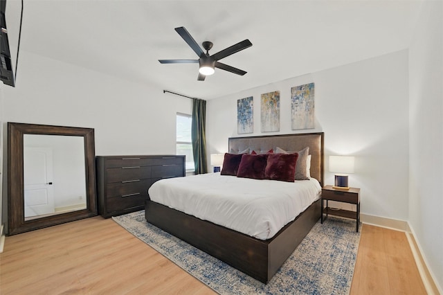 801 Edgefield Rd, Fort Worth, TX 76107 - bedroom with wood finished floors, baseboards, and a ceiling fan