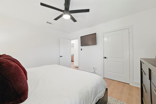 801 Edgefield Rd, Fort Worth, TX 76107 - bedroom with light wood-type flooring and a ceiling fan