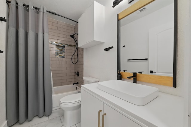 801 Edgefield Rd, Fort Worth, TX 76107 - bathroom with toilet, vanity, shower / tub combo, and marble look tiles