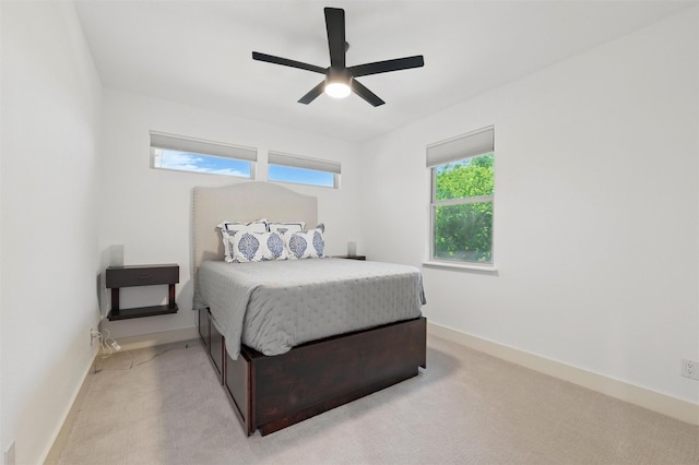 801 Edgefield Rd, Fort Worth, TX 76107 - bedroom with light carpet, ceiling fan, and baseboards