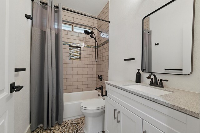 801 Edgefield Rd, Fort Worth, TX 76107 - full bathroom featuring vanity, shower / bath combo, toilet, and tile patterned floors