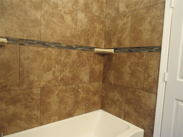 2817 Henry Rd, Lancaster, TX 75134 - bathroom view of a tub to relax in and a shower