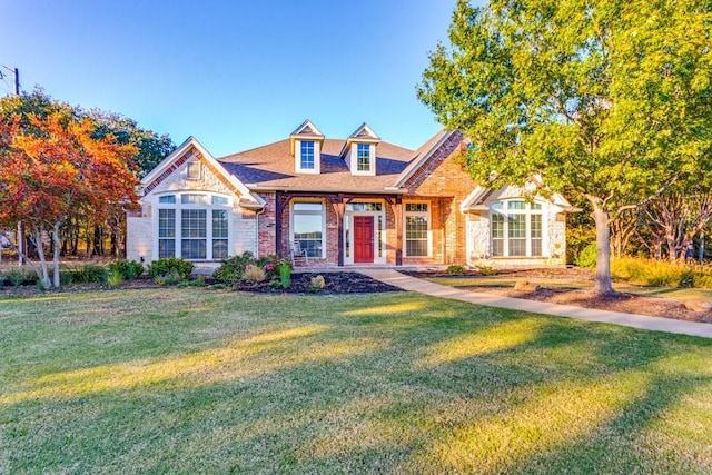 6306 Shadow Valley Dr, Burleson, TX 76028 - view of front facade featuring brick siding, a front lawn, and stone siding