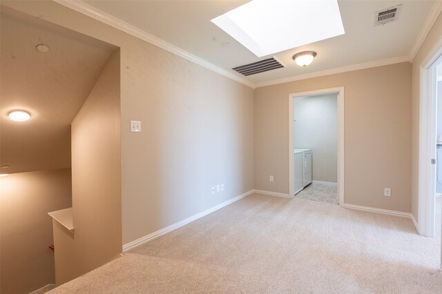 3075 Willow Grove Blvd Unit 1105, Mckinney, TX 75070 - spare room with washer and clothes dryer, light carpet, a skylight, and crown molding