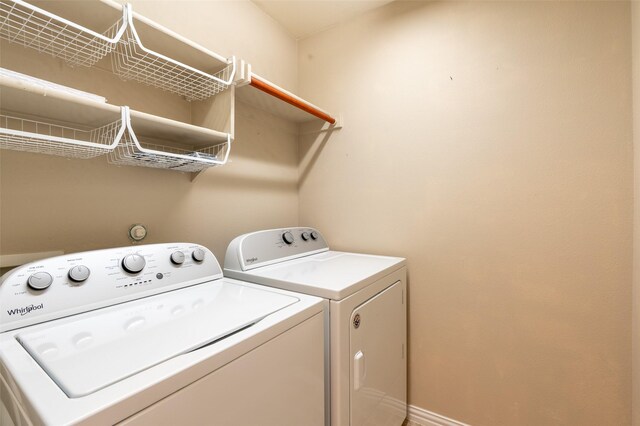 3075 Willow Grove Blvd Unit 1105, Mckinney, TX 75070 - laundry room featuring washer and dryer and baseboards
