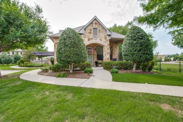 3075 Willow Grove Blvd Unit 1105, Mckinney, TX 75070 - tudor house featuring stone siding