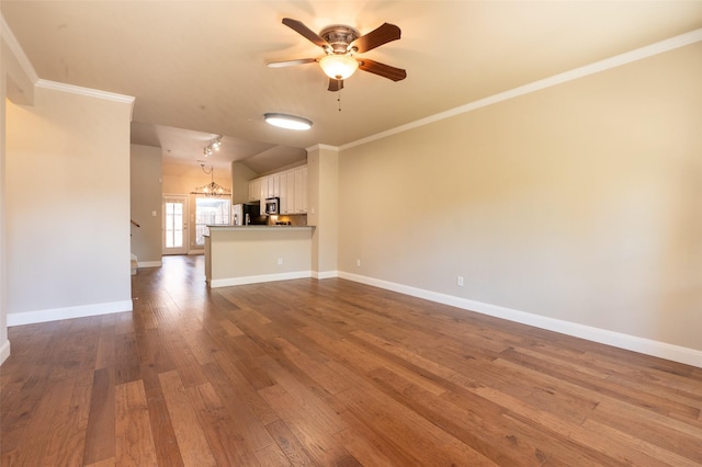 3075 Willow Grove Blvd Unit 1105, Mckinney, TX 75070 - unfurnished living room with a ceiling fan, dark wood-type flooring, lofted ceiling, and ornamental molding