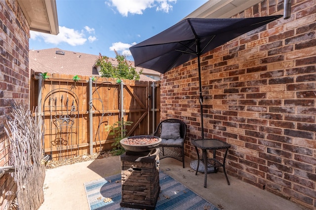 3075 Willow Grove Blvd Unit 1105, Mckinney, TX 75070 - view of patio / terrace featuring a gate