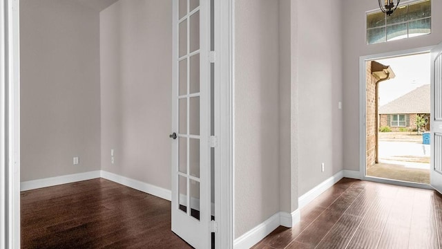 4907 Lakepark Dr, Sanger, TX 76266 - foyer entrance with dark wood-style floors and baseboards
