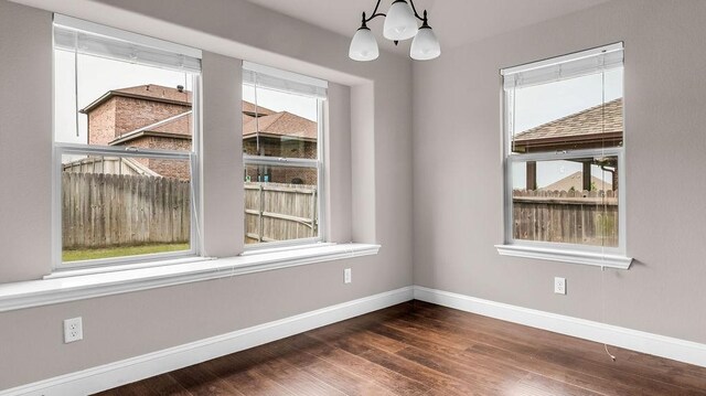4907 Lakepark Dr, Sanger, TX 76266 - empty room with baseboards, plenty of natural light, and dark wood finished floors