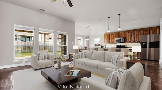 4907 Lakepark Dr, Sanger, TX 76266 - living area with ceiling fan, dark wood finished floors, baseboards, and recessed lighting