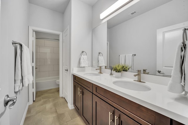 212 Saint Tropez Dr, Southlake, TX 76092 - bathroom featuring double vanity, toilet, and baseboards