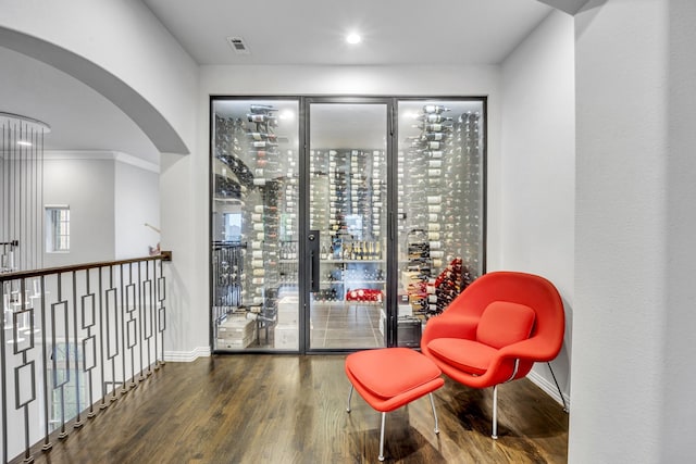 212 Saint Tropez Dr, Southlake, TX 76092 - wine area with wood finished floors, arched walkways, baseboards, and recessed lighting