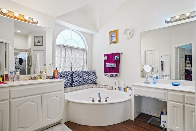 5000 Coral Creek Dr, Fort Worth, TX 76135 - full bath featuring a stall shower, a garden tub, wood finished floors, and vanity