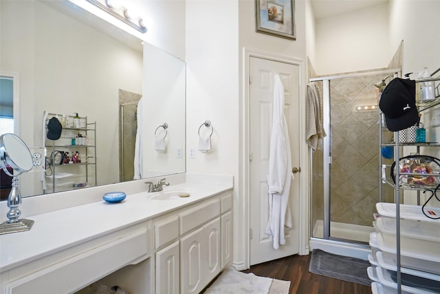 5000 Coral Creek Dr, Fort Worth, TX 76135 - bathroom featuring a stall shower, wood finished floors, and vanity