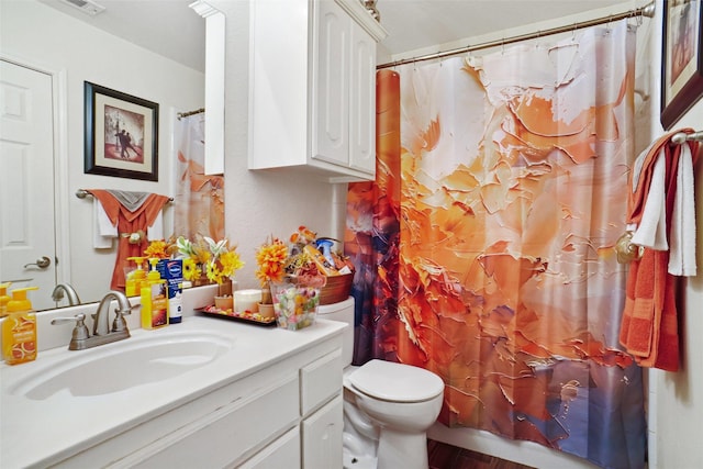 5000 Coral Creek Dr, Fort Worth, TX 76135 - full bathroom featuring toilet, wood finished floors, and vanity