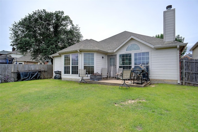 5000 Coral Creek Dr, Fort Worth, TX 76135 - rear view of house featuring an outdoor fire pit, a chimney, a patio area, and a shingled roof