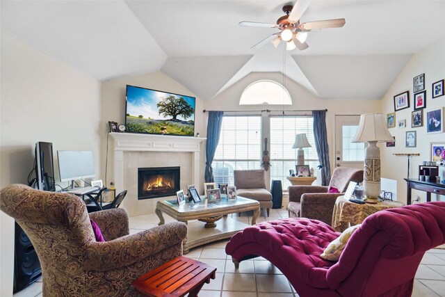 5000 Coral Creek Dr, Fort Worth, TX 76135 - living room with a tiled fireplace, light tile patterned floors, ceiling fan, and vaulted ceiling