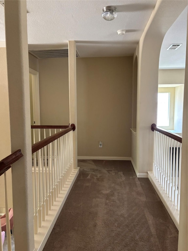 1435 Delta Dr, Cedar Hill, TX 75104 - corridor featuring dark carpet
