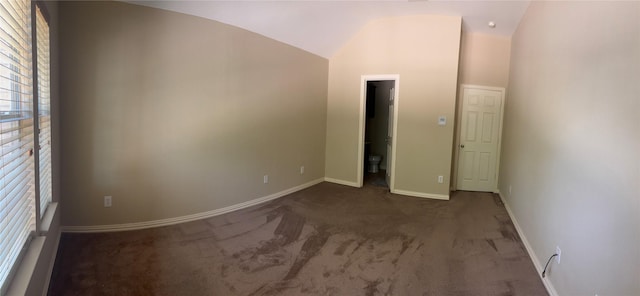1435 Delta Dr, Cedar Hill, TX 75104 - unfurnished bedroom with carpet floors, lofted ceiling, and baseboards