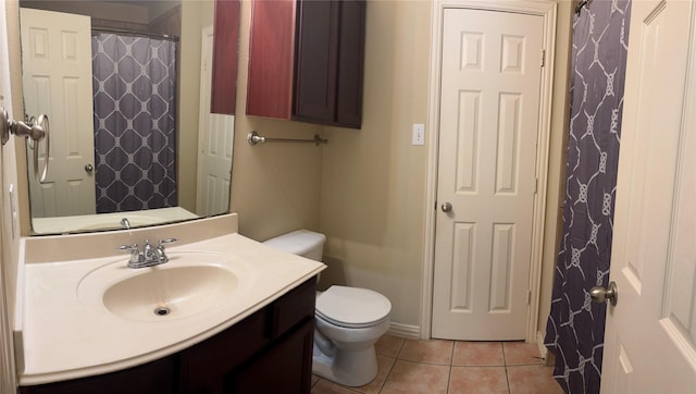 1435 Delta Dr, Cedar Hill, TX 75104 - bathroom featuring tile patterned floors, vanity, and toilet