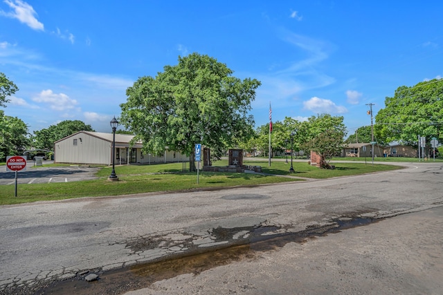 209 S Britton St, Tom Bean, TX 75489 - view of front of house featuring a front yard
