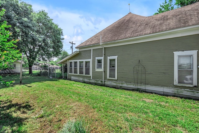 209 S Britton St, Tom Bean, TX 75489 - rear view of house featuring a shingled roof