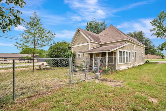 209 S Britton St, Tom Bean, TX 75489 - back of house featuring a gate and a shingled roof