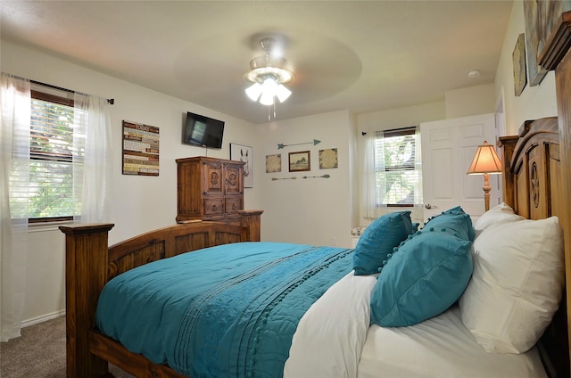 701 Elmhill Blvd, Burleson, TX 76028 - bedroom with carpet floors, baseboards, and ceiling fan
