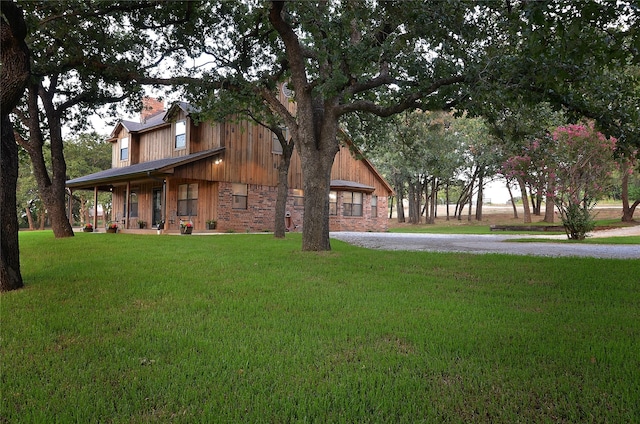 701 Elmhill Blvd, Burleson, TX 76028 - view of front facade featuring covered porch, a front lawn, and a chimney