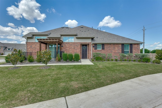 617 Cloverleaf Dr, Wylie, TX 75098 - view of front of house featuring a pergola, brick siding, and roof with shingles