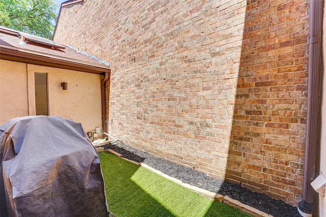 3326 Courtyard Pl, Farmers Branch, TX 75234 - view of side of property with brick siding and stucco siding