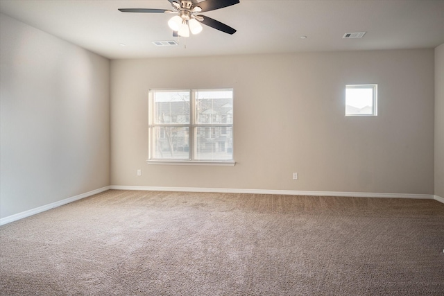 101 Springtree St, Denton, TX 76209 - empty room featuring carpet flooring, a ceiling fan, and baseboards