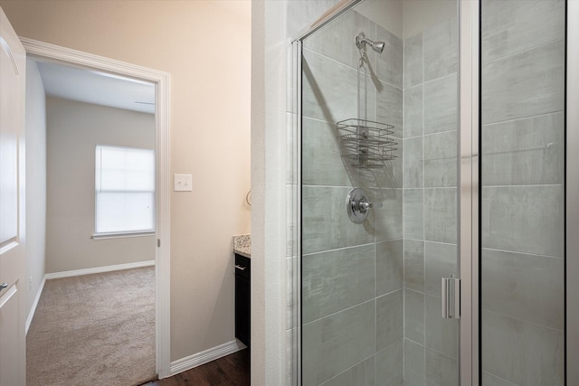 101 Springtree St, Denton, TX 76209 - bathroom featuring a shower stall, vanity, and baseboards