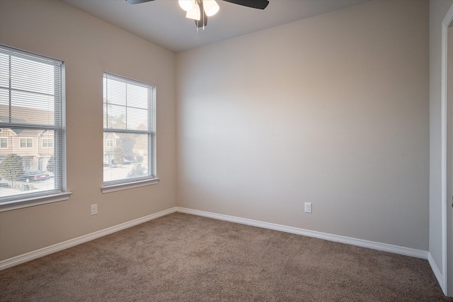 101 Springtree St, Denton, TX 76209 - carpeted spare room featuring a ceiling fan and baseboards