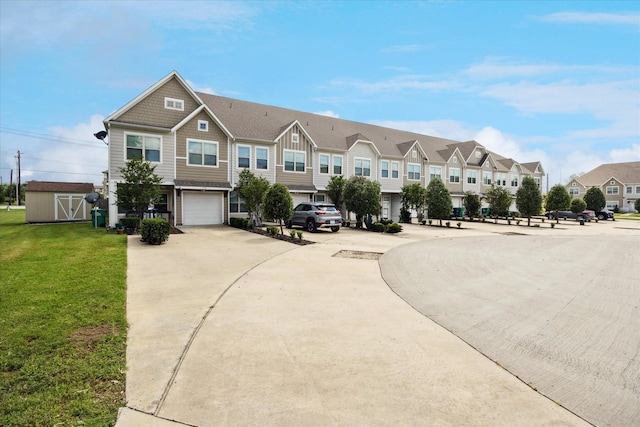 101 Springtree St, Denton, TX 76209 - view of front facade with a garage, a residential view, concrete driveway, and a front lawn
