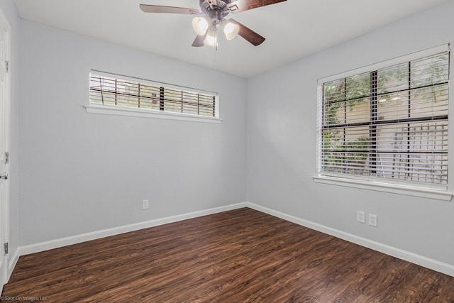 2409 Klondike Dr, Dallas, TX 75228 - empty room featuring dark wood-style floors, baseboards, and ceiling fan