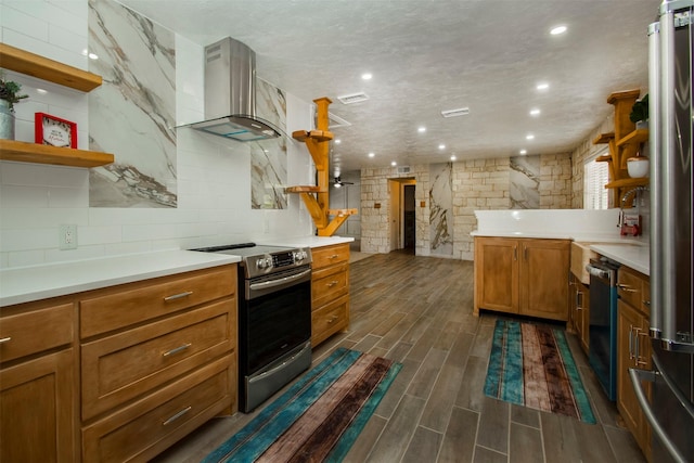 10578 High Hollows Dr Unit 269, Dallas, TX 75230 - kitchen with stainless steel electric range, open shelves, wall chimney exhaust hood, brown cabinets, and light countertops