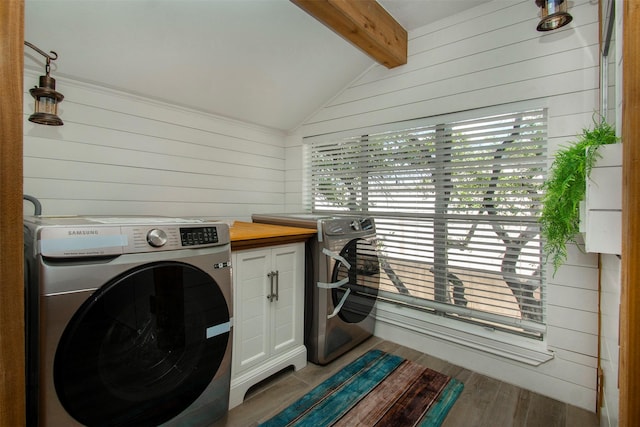 10578 High Hollows Dr Unit 269, Dallas, TX 75230 - clothes washing area featuring wood walls, wood finished floors, and cabinet space