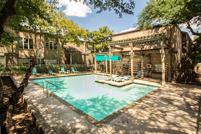 10578 High Hollows Dr Unit 269, Dallas, TX 75230 - community pool with fence, a pergola, and a patio