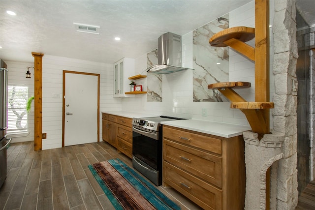 10578 High Hollows Dr Unit 269, Dallas, TX 75230 - kitchen featuring open shelves, electric stove, wall chimney exhaust hood, dark wood-style floors, and light countertops