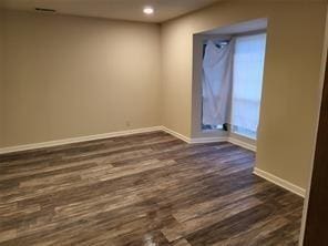 5728 Rockhill Rd, Fort Worth, TX 76112 - spare room featuring dark wood-style floors, baseboards, and recessed lighting