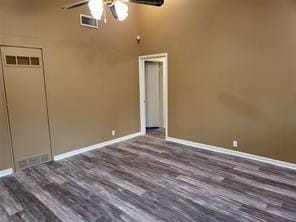 5728 Rockhill Rd, Fort Worth, TX 76112 - empty room featuring ceiling fan, wood finished floors, and baseboards
