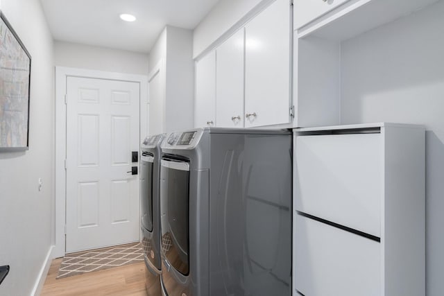 15732 Nedra Way, Dallas, TX 75248 - washroom with washing machine and dryer, cabinet space, light wood-style flooring, recessed lighting, and baseboards